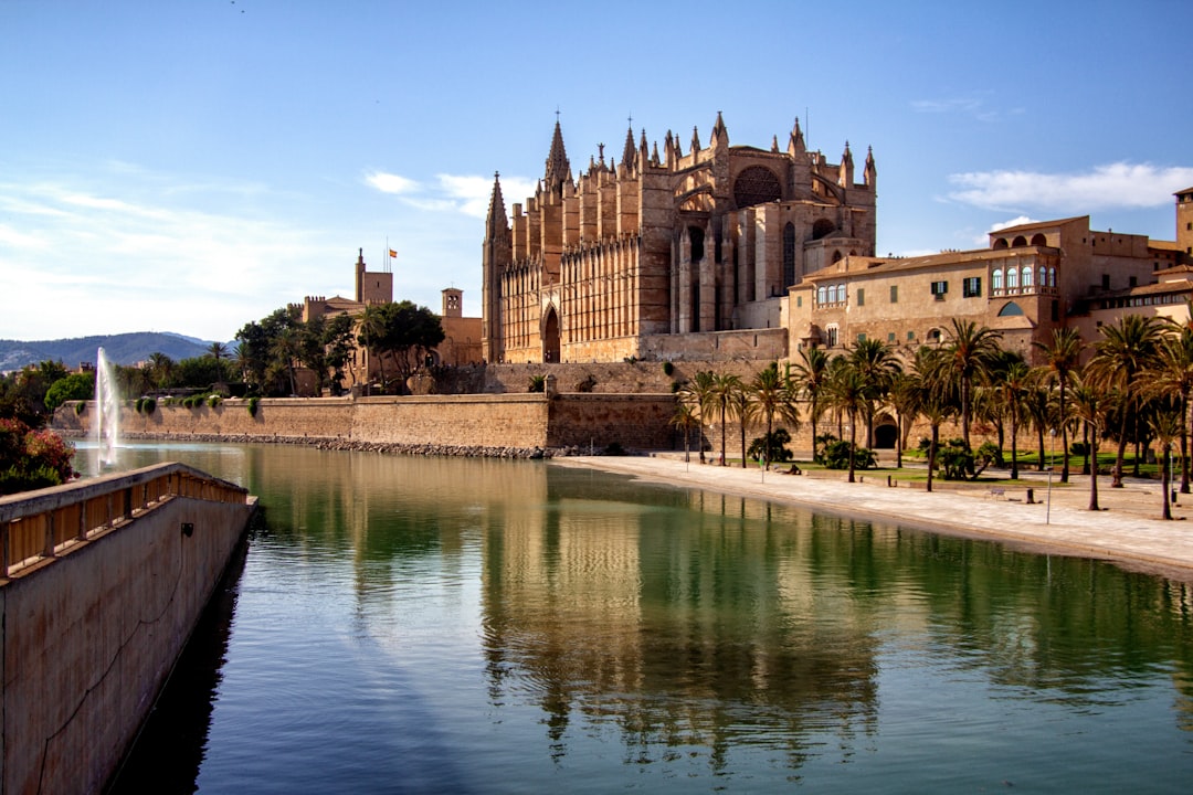 Palma Cathedral reflected in the pond, headquarters of management services for companies of Gestoría G1 in Mallorca